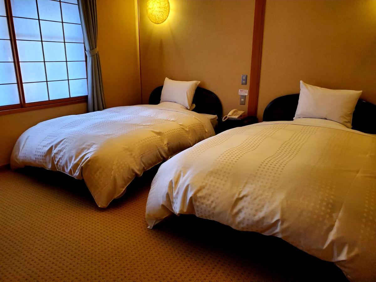 Ryotei Tanokura Hotel Yufu Exterior photo