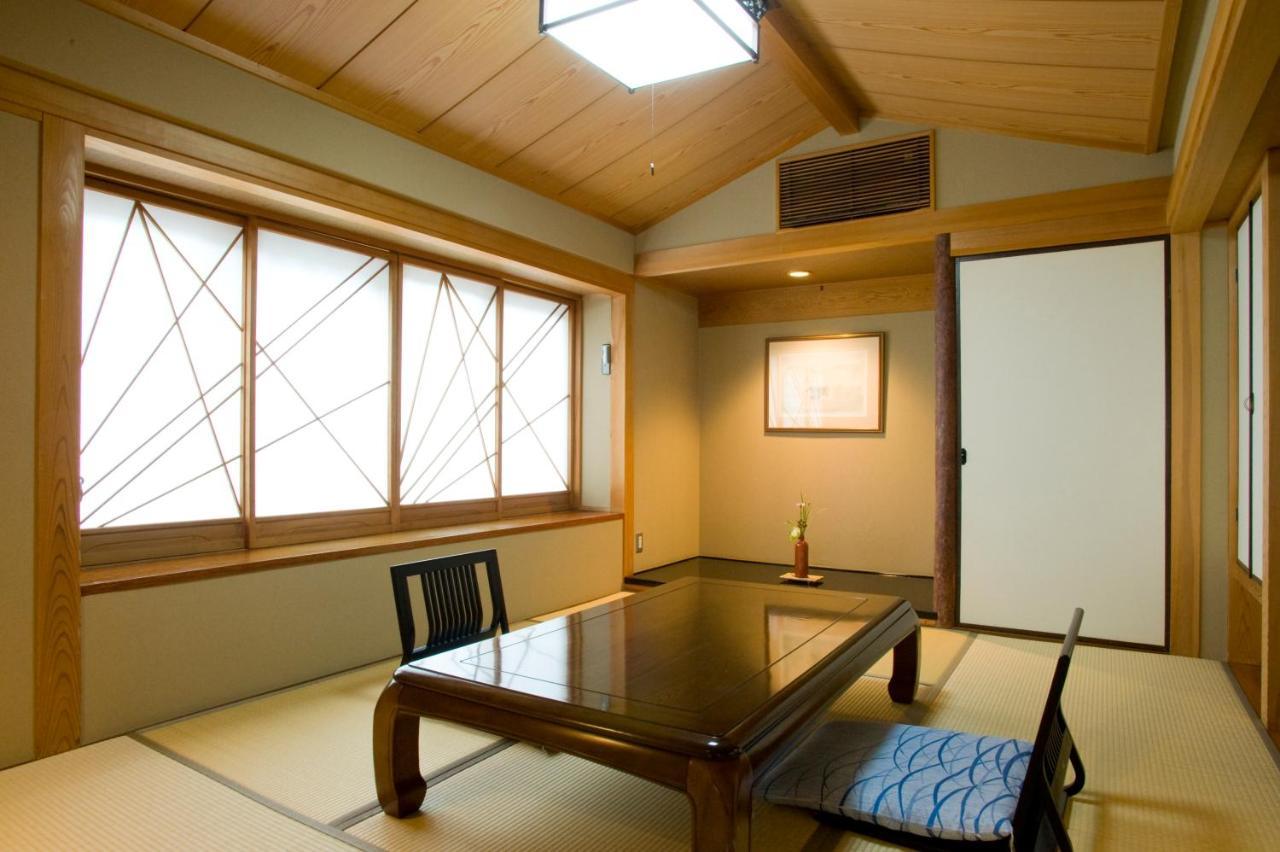 Ryotei Tanokura Hotel Yufu Exterior photo