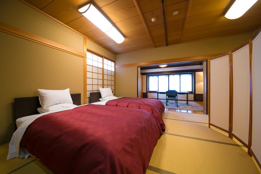 Ryotei Tanokura Hotel Yufu Exterior photo